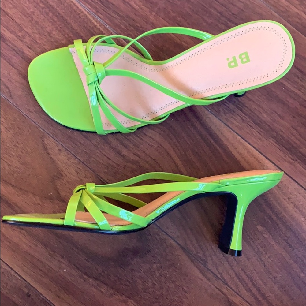 Bright green sandals with a heel